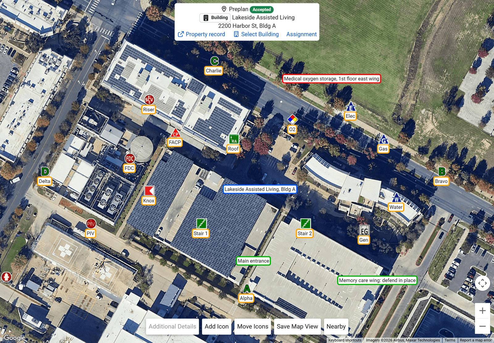 The preplan map in FireInspection360: the satellite view of an assisted living facility with the FDC, PIV, riser, alarm panel, key box, shutoffs, generator, stairways, roof access and the four sides marked, labelled text boxes for the entrance, a hazard and the memory care wing, and the preplan header card (sample data)