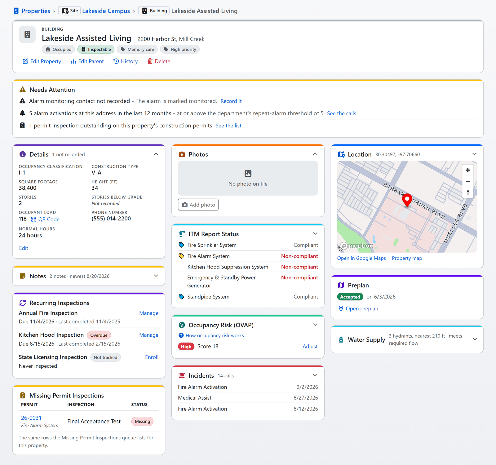 A property record in FireInspection360 for an assisted living facility: the header with its chips, the Needs Attention band, and the cards for details, photos, location on a map, ITM report status, occupancy risk, incidents, recurring inspections, water supply, preplan and missing permit inspections (sample data)